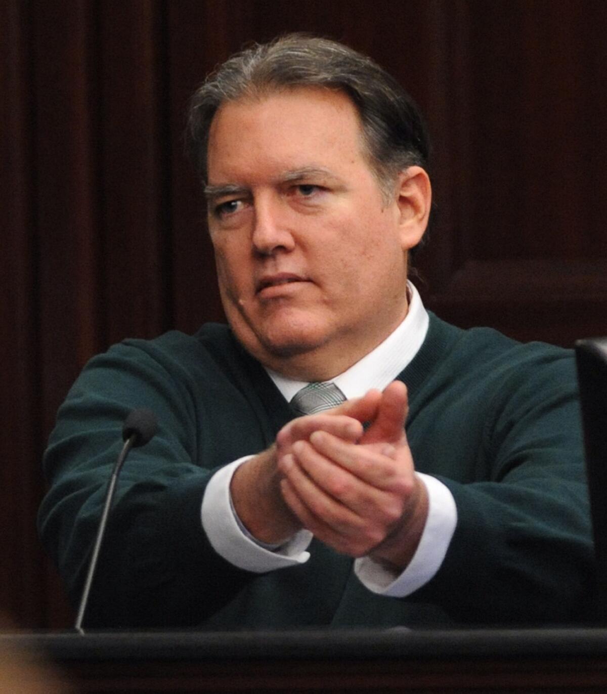 Michael Dunn on the stand during his trial in Jacksonville, Fla. The jury is now deliberating the case. Dunn is charged with murder in the fatal shooting of 17-year-old Jordan Davis after an argument over loud music.