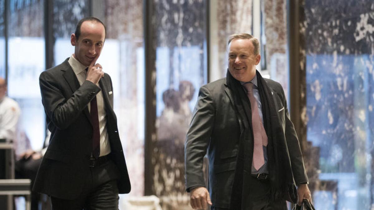 Stephen Miller, senior policy adviser to President Trump, and Sean Spicer, White House press secretary, at Trump Tower in New York.