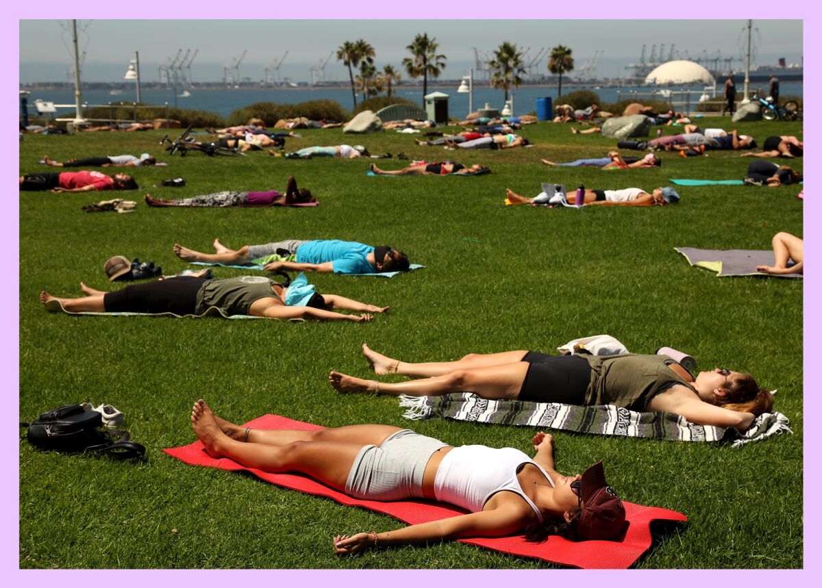 The best summit-worthy snacks to help you refuel on your hike 12 People practice the yoga pose Shavasana on the grass