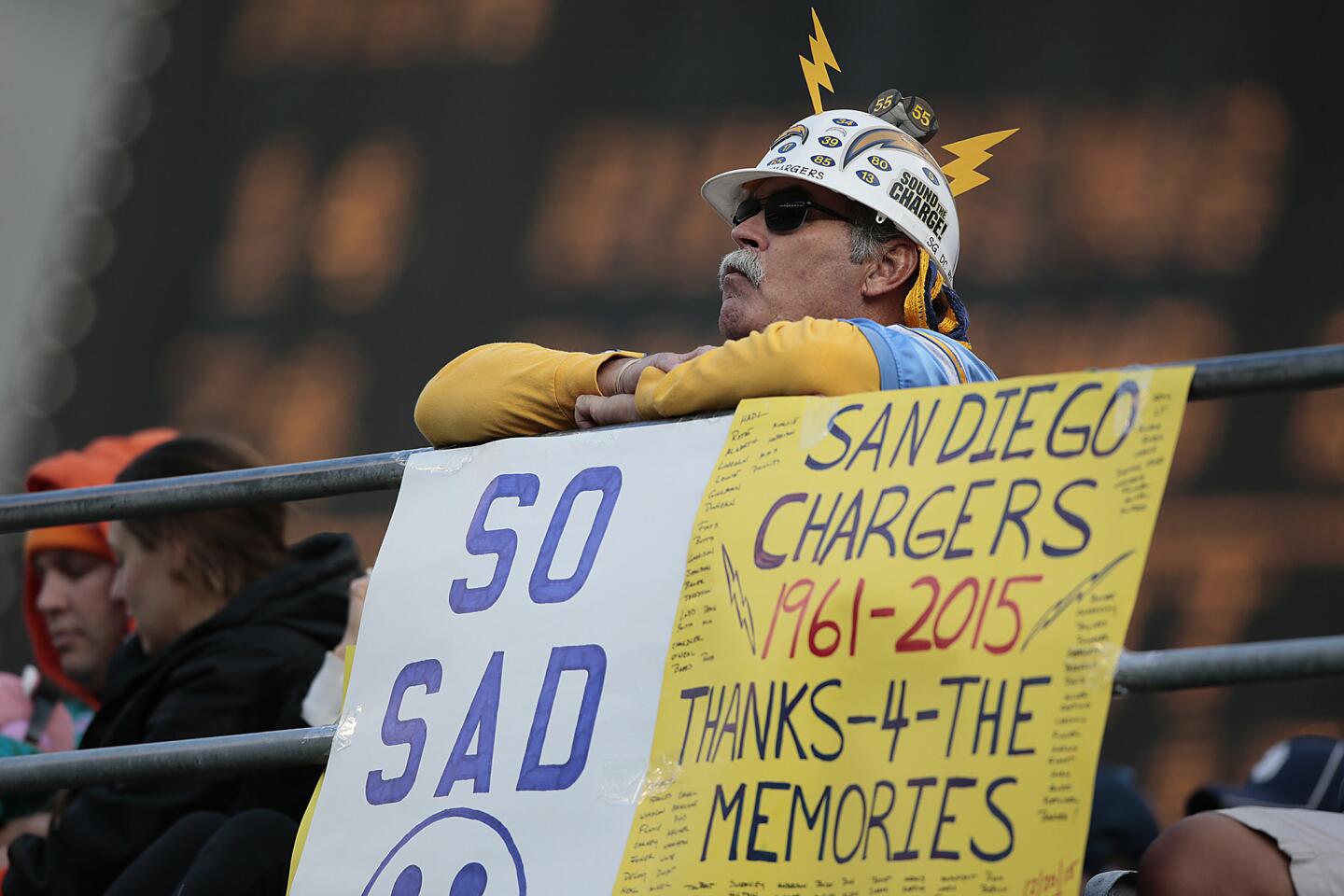 Kenny Baker of La Mesa is not a happy fan as he watches the Chargers defeat the Dolphins on Sunday.