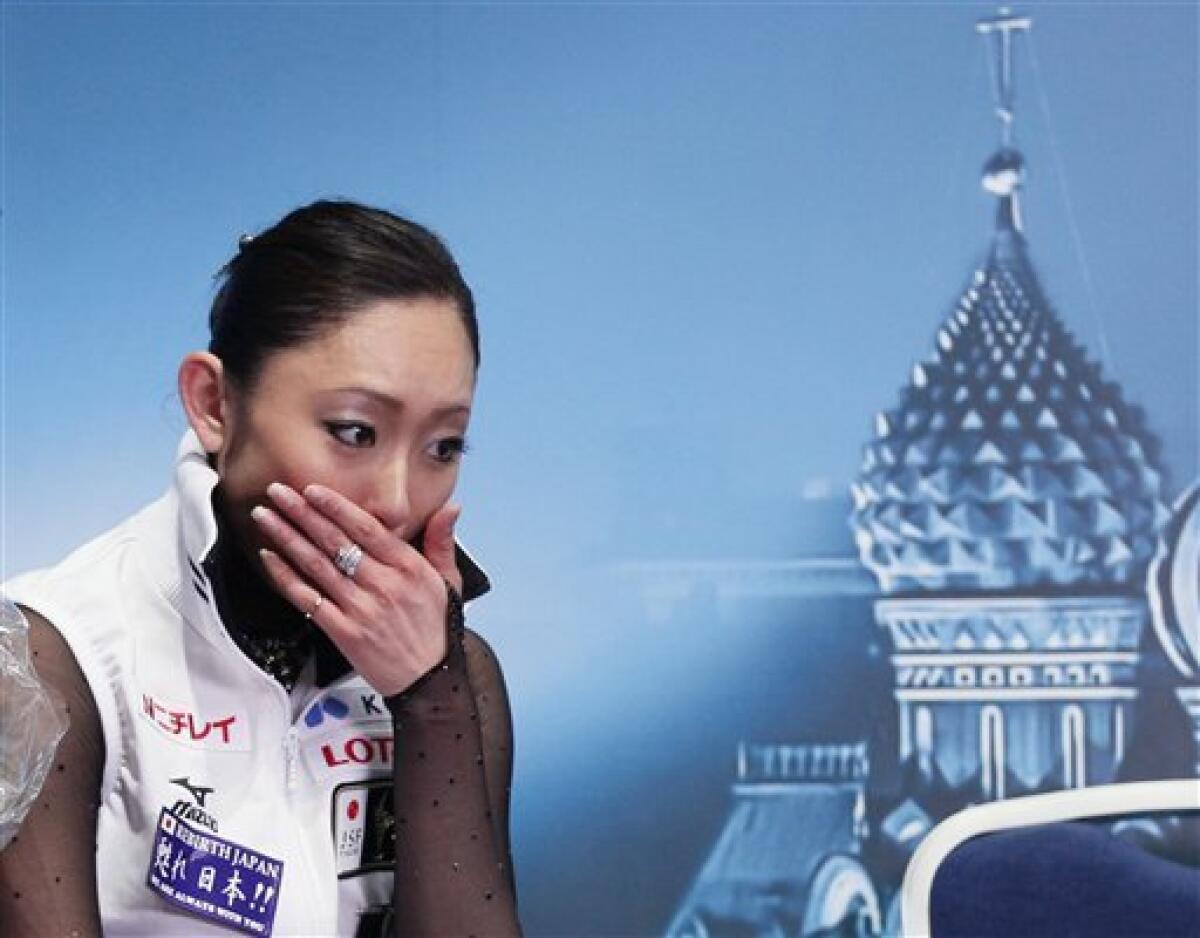 Japan's Miki Ando reacts after performing her free program at the ISU Figure Skating World championships in Moscow, Russia, Saturday, April 30, 2011. (AP Photo/Dmitry Lovetsky)