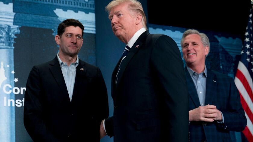 President Trump, center, with House Speaker Paul D. Ryan (R-Wis.), left, and House Majority Leader Kevin McCarthy (R-Bakersfield), attends a GOP retreat in West Virginia last week.