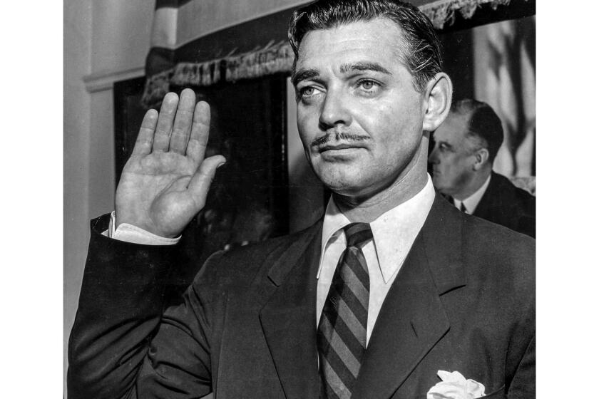 Aug. 12, 1942: Actor Clark Gable takes oath as Army private at the Federal Building in Los Angeles.