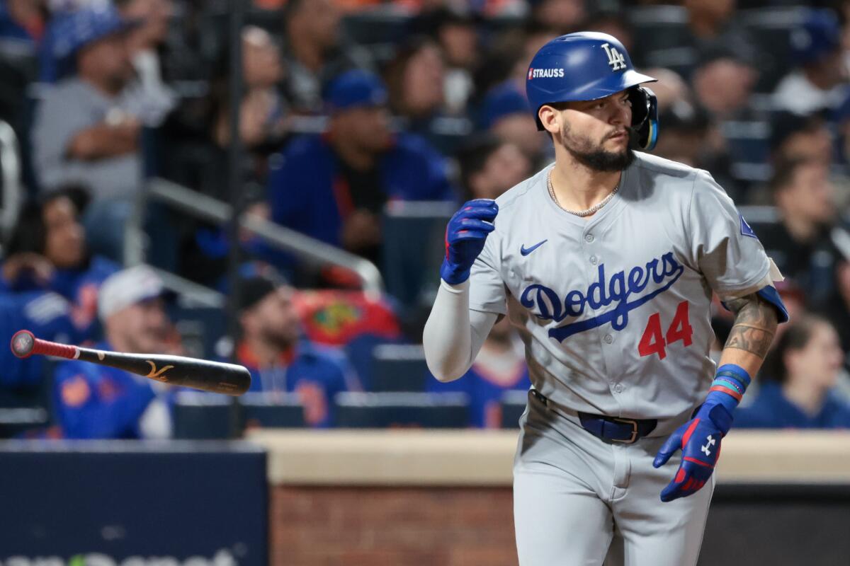 Andy Pages tosses his bat after hitting a solo home run for the Dodgers against the Mets at Citi Field.