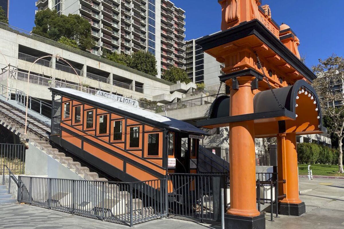 The orange Angels Flight Gate with one of the cars of the funicular in downtown Los Angeles.