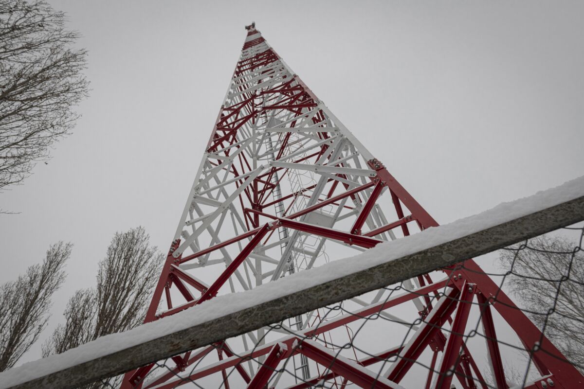 A view of a phone tower of Ukrainian mobile telephone network operator Kyivstar seen in the outskirts of Kyiv, Ukraine, Wednesday, Nov. 30, 2022. With Ukraine racing to keep communications lines open in wartime, the country's phone operators have mobilized more than usual to help people stay in touch — such as by revving up generators to power mobile towers after Russian strikes took out the electricity they usually run on. (AP Photo/Andrew Kravchenko)