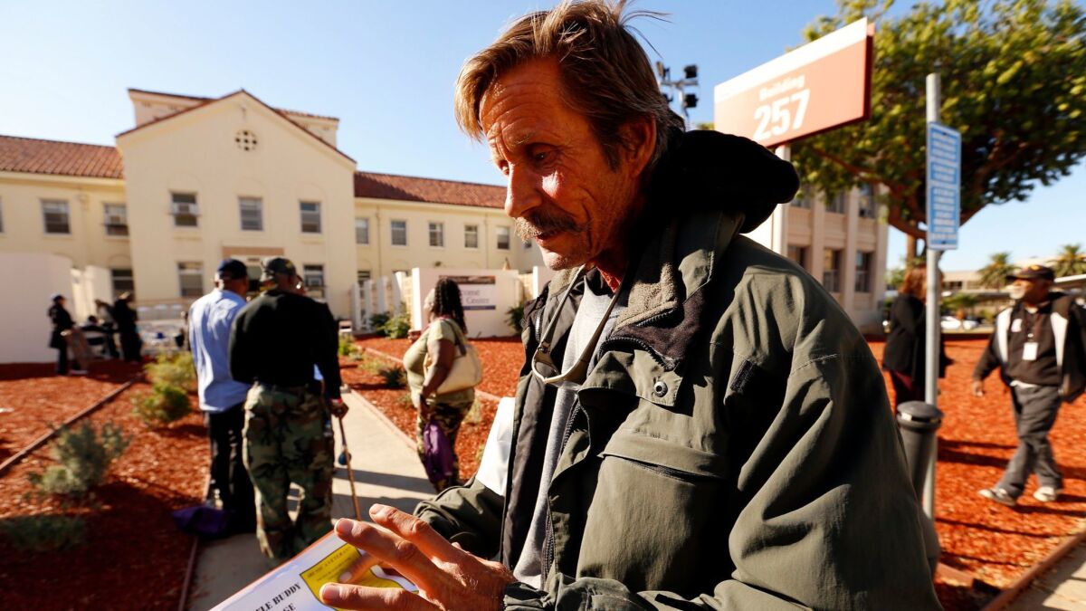 Homeless veteran Jake Cameron Mitchell seeks assistance during an event at the Veterans Affairs West Los Angeles campus in 2015.