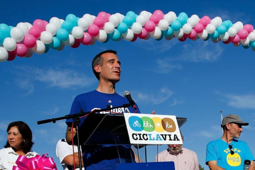 Mayor Eric Garcetti welcomes Cyclists, pedestrians and neighbors on the street during Ciclavia on Oct. 5, 2014, in Los Angeles.
