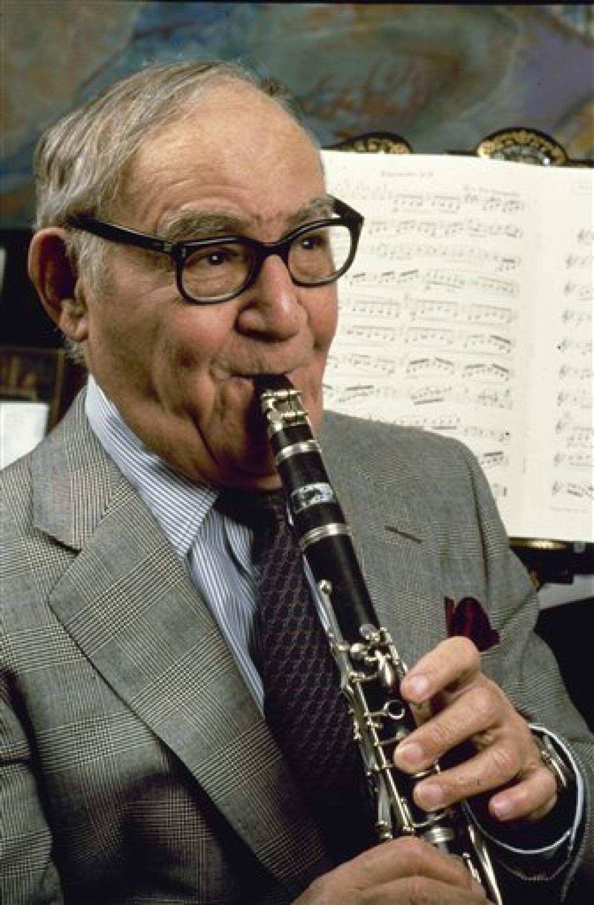 FILE - In this Feb. 1986 file photo, Jazz clarinetist Benny Goodman, performs in his New York apartment. (AP Photo/Carlos Rene Perez, file)