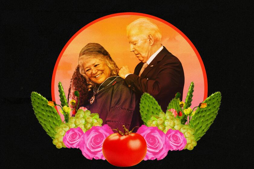 US President Joe Biden, center right, presents the Presidential Medal of Freedom to Teresa Romero, president of the United Farm Workers (UFW), during a ceremony in the East Room of the White House in Washington, DC, US.
