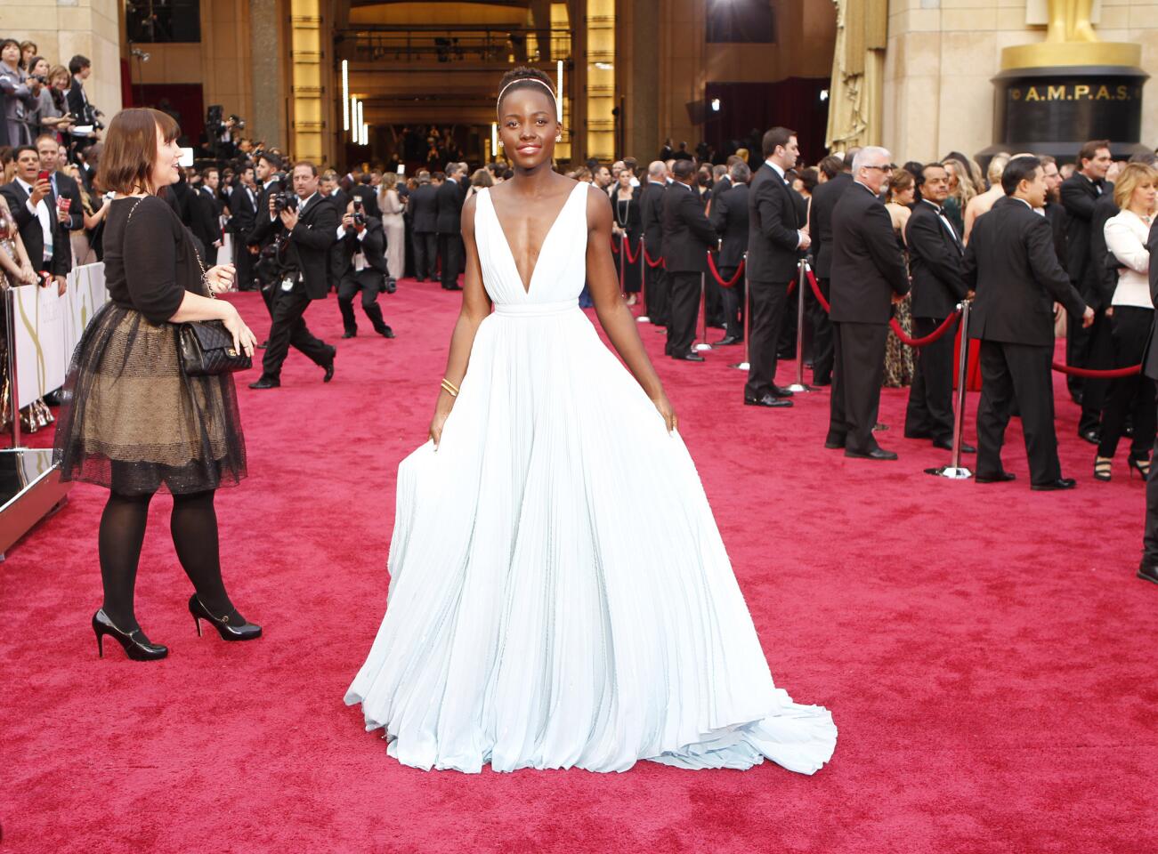Lupita Nyong'o, who won the supporting actress award for "12 Years a Slave," wore a custom Prada light blue silk gown to the Oscars.