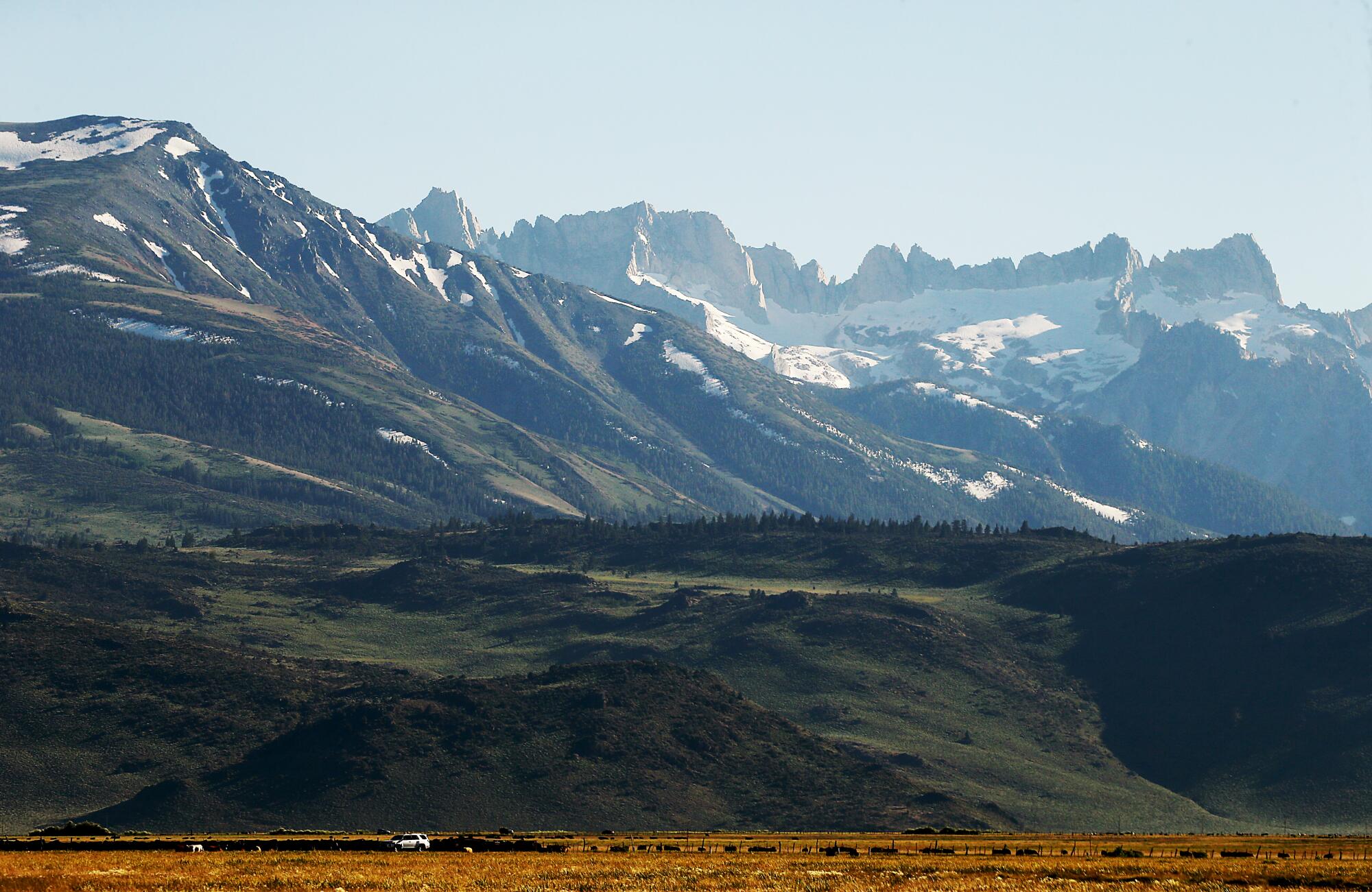 Pockets of snow cling to the Sierra Nevada near Mammoth Lakes.