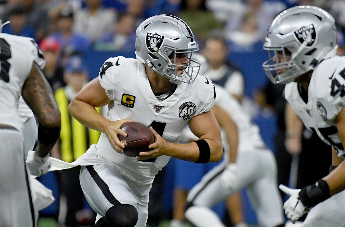 Raiders quarterback Derek Carr drops back to pass during a win over the Indianapolis Colts on Sunday.