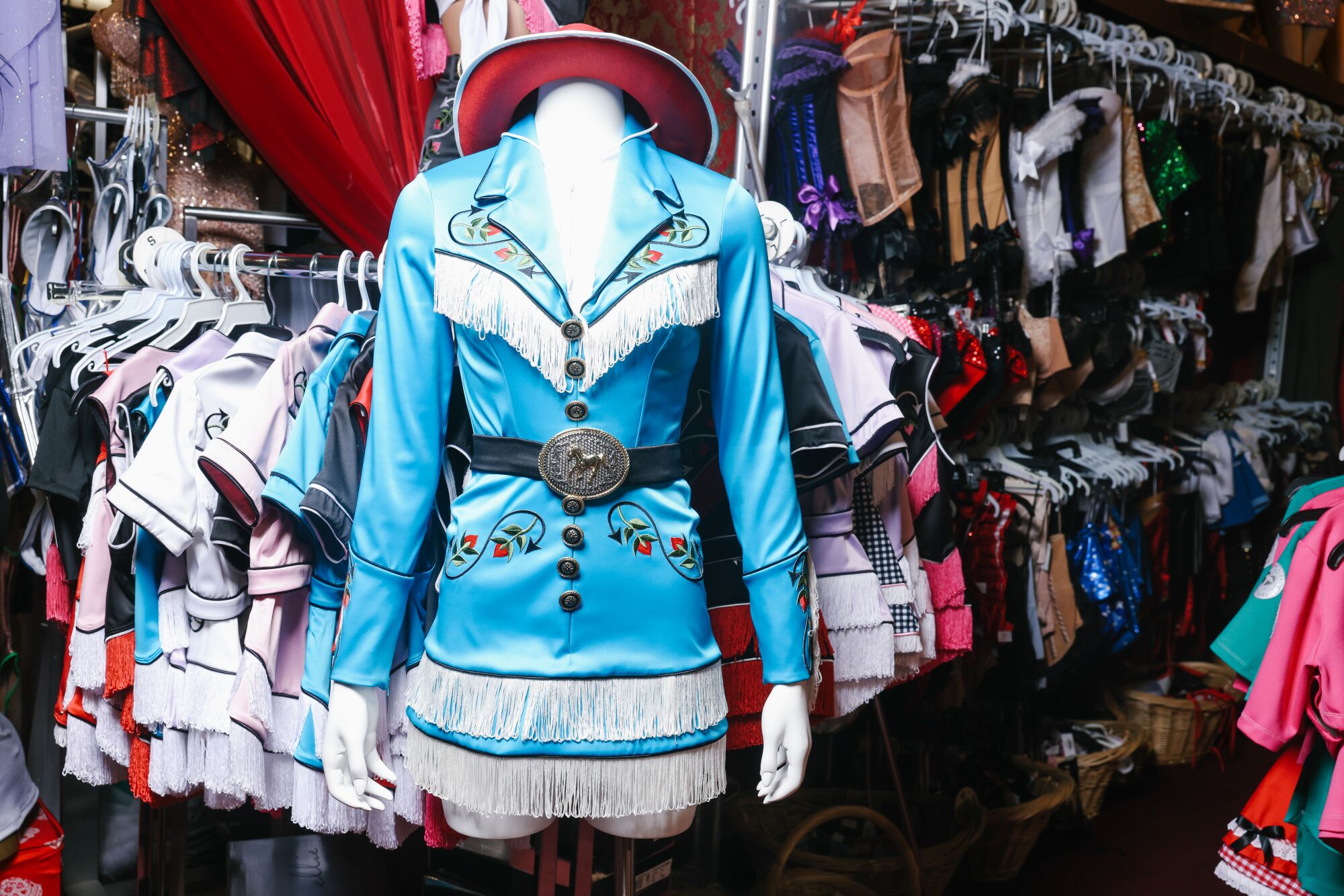 A blue western-themed costume on a mannequin.