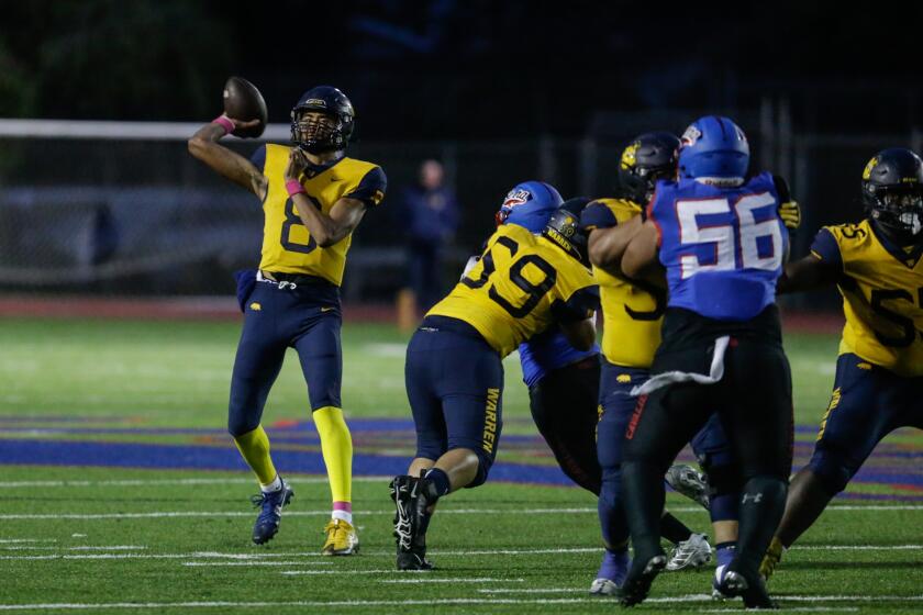 GARDENA, CA - SEPTEMBER 09: Downey Warren quarterback Nico Iamaleava (8) passes against Gardena Serra on Friday, Sept. 9, 2022 in Gardena, CA. (Jason Armond / Los Angeles Times)