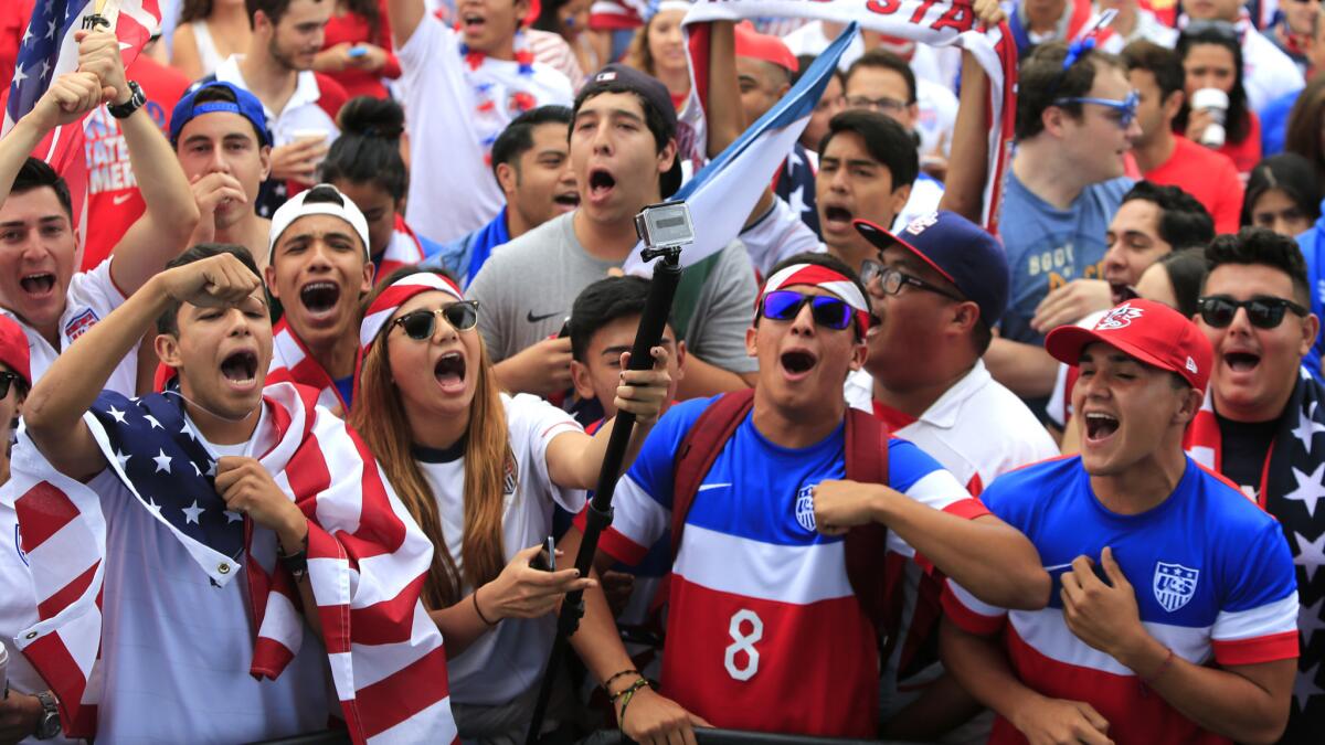 Fans in Hermosa Beach cheer for the U.S. soccer team during its World Cup match against Germany on June 26. Does the growing popularity of the World Cup in the United States bode well for Major League Soccer?