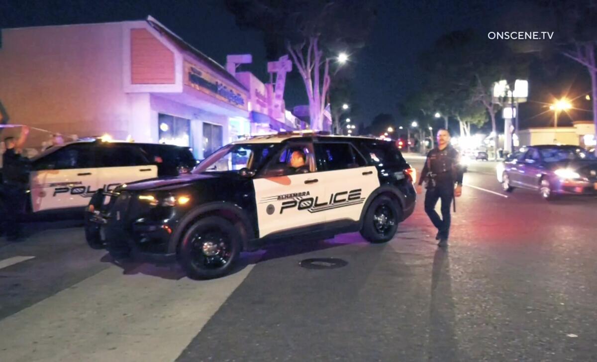 Police cars stopped on a street