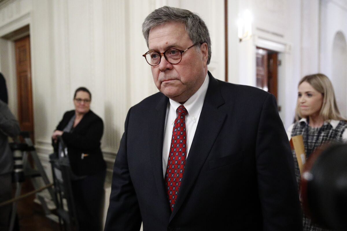 Attorney General William Barr arrives before President Donald Trump presents the Medal of Freedom to former Vice Chief of Staff of the Army Gen. Jack Keane in the East Room of the White House in Washington, Tuesday, March 10, 2020. (AP Photo/Patrick Semansky)