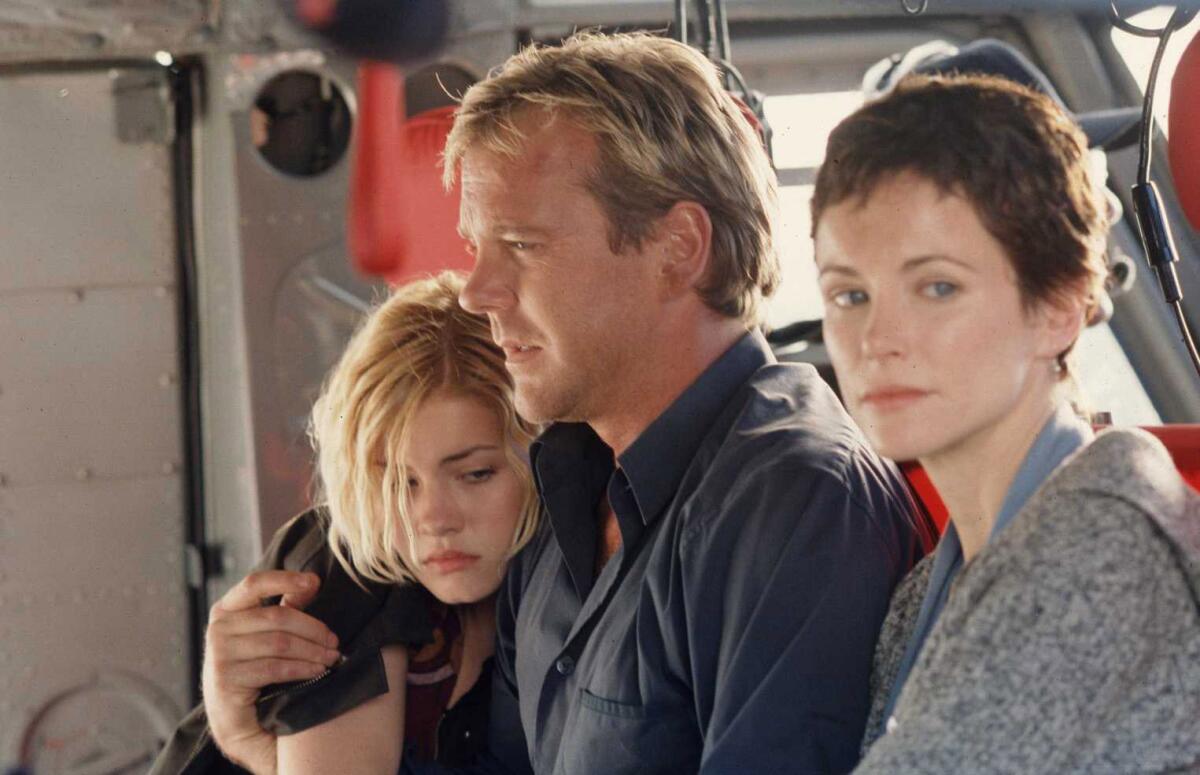 A scene from "24." Elisha Cuthbert, Kiefer Sutherland, and Leslie Hope.