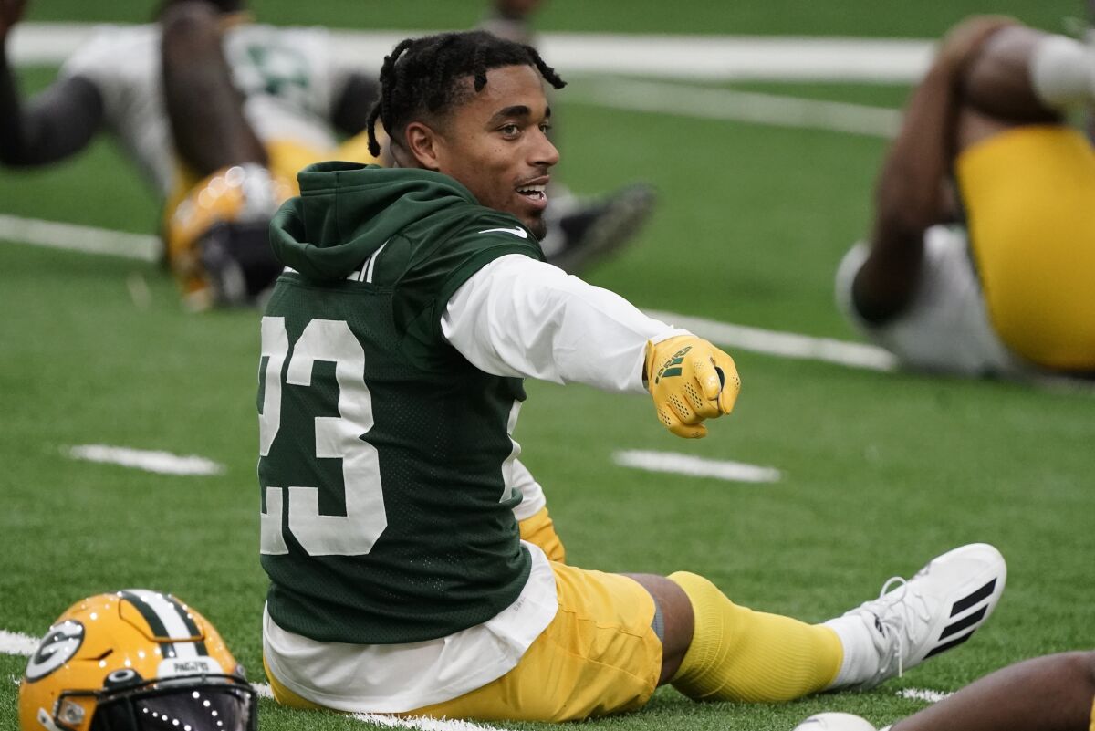 Green Bay Packers' Jaire Alexander stretches at the NFL football team's practice field Tuesday, June 7, 2022, in Green Bay, Wis. (AP Photo/Morry Gash)