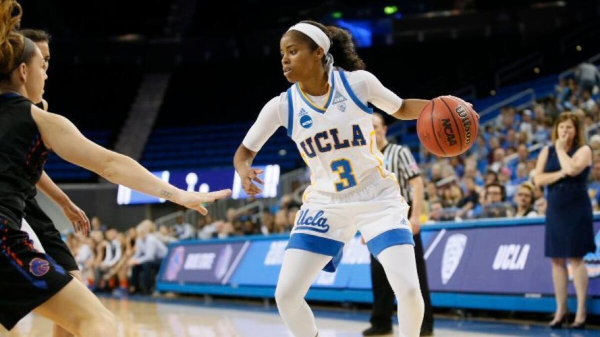 UCLA guard Jordin Canada controls the ball against Penn during an NCAA tournament first-round game on Saturday.