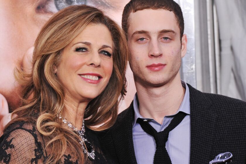 Rapper Chet Hanks, photographed here with his mother Rita Wilson in 2011, is defending the use of the N-word.