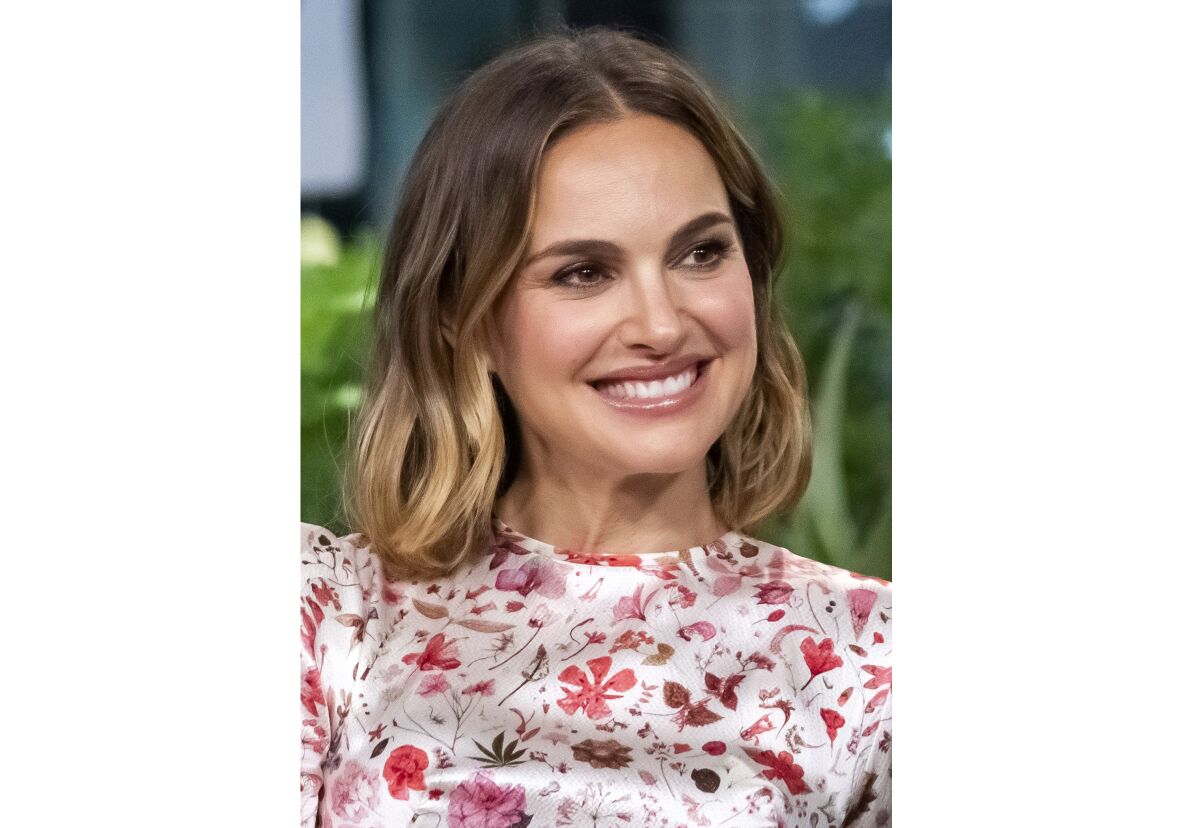 FILE - Natalie Portman participates in the BUILD Speaker Series to discuss the film "Lucy in the Sky" on Oct. 2, 2019, in New York.The Oscar-winning actress has agreed to serve as honorary chair of National Library Week, the American Library Association announced Monday. National Library Week will run next April 4-10, and Portman will help promote the role libraries have played in their communities during the pandemic. (Photo by Charles Sykes/Invision/AP, File)
