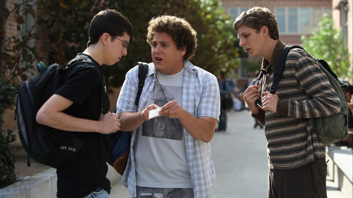 Christopher Mintz-Plasse, left, Hill and Michael Cera in a scene from "Superbad."