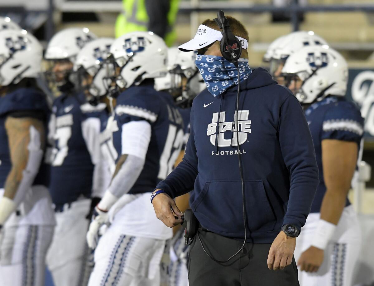 Utah State coach Gary Andersen watches the team during the first half of an NCAA college football game against San Diego State, Saturday, Oct. 31, 2020, in Logan, Utah. (Eli Lucero/The Herald Journal via AP, Pool)
