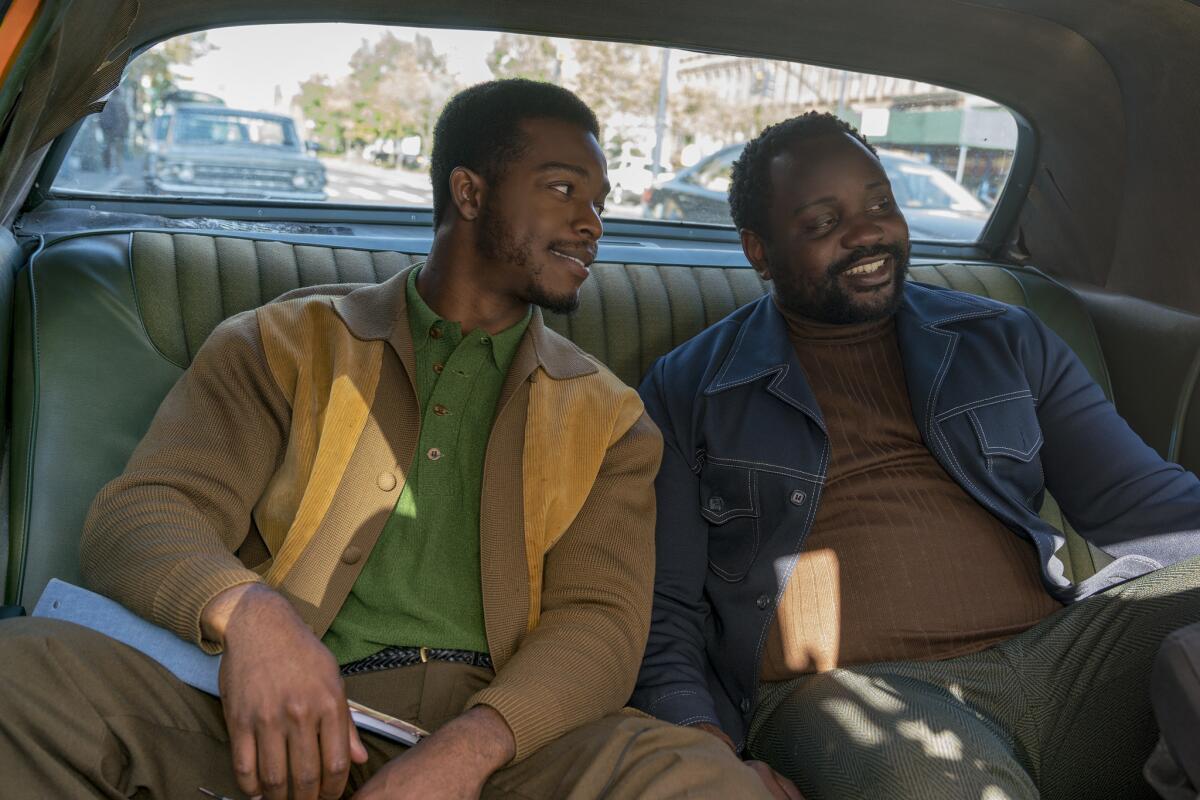 Stephan James, left, as Fonny and Brian Tyree Henry as Daniel in Barry Jenkins' "If Beale Street Could Talk."