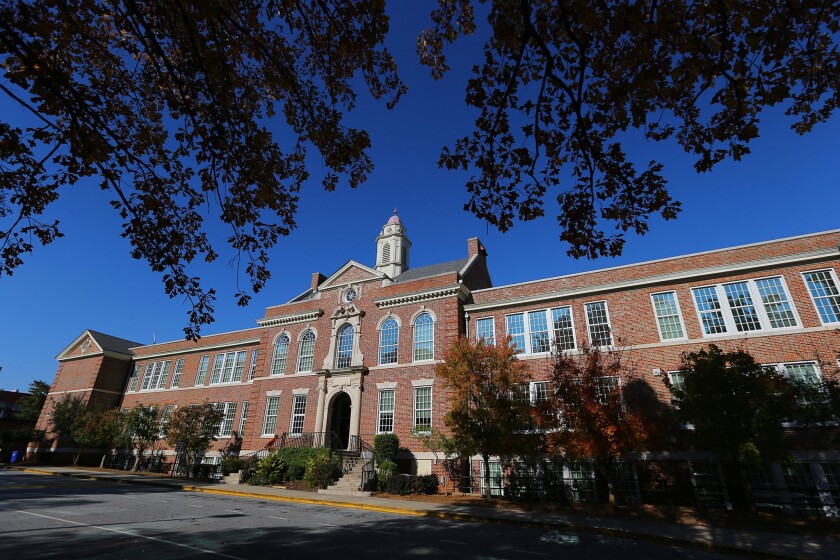 Druid Hills High School is shown in this undated photo, in suburban Atlanta. On Monday, April 18, 2022, the DeKalb County School Board is expected to consider renovations for the high school after a video documentary by students highlighted issues with the crumbling school. (Curtis Compton/Atlanta Journal-Constitution via AP)