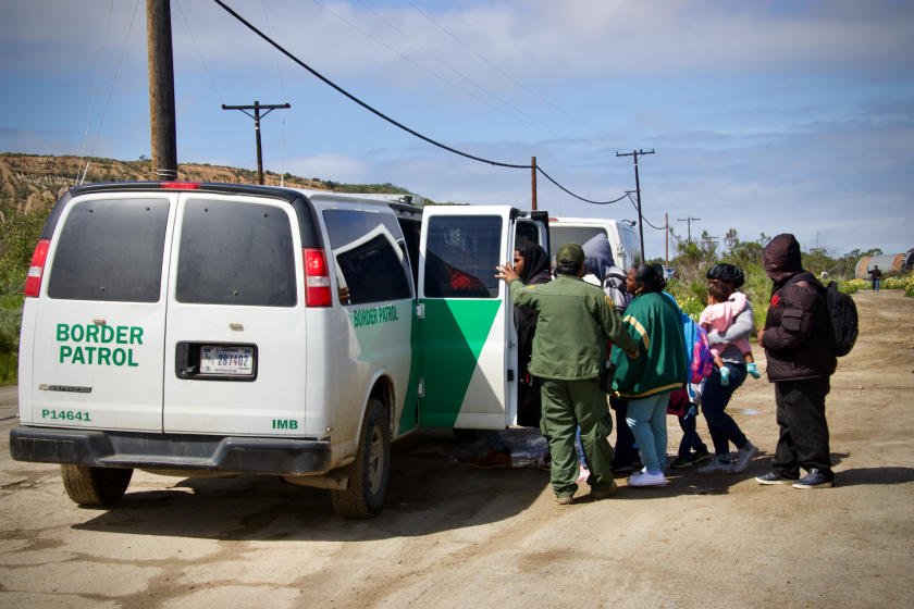 Border Patrol apprehend people at the U.S. Mexico border
