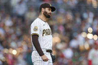 San Diego Padres starting pitcher Dylan Cease reacts during the fourth inning of the team's baseball game against the Philadelphia Phillies, Saturday, April 27, 2024, in San Diego. (AP Photo/Brandon Sloter)