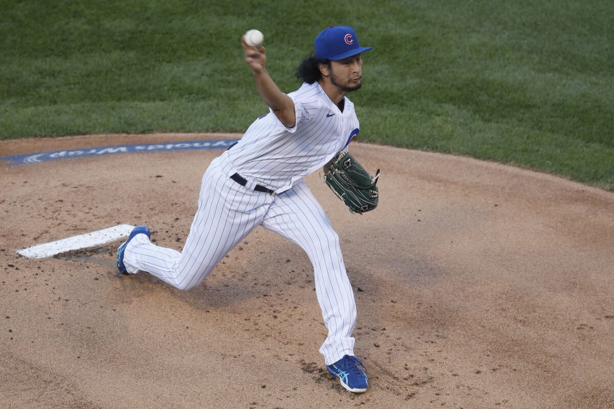 Chicago Cubs starting pitcher Yu Darvish delivers during the first inning of a baseball game against the Milwaukee Brewers, Thursday, Aug. 13, 2020, in Chicago. (AP Photo/Jeff Haynes)