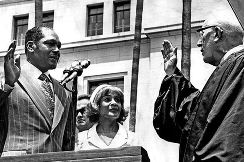 Tom Bradley, with wife Ethel, being sworn-in as mayor by Justice Earl Warren in Los Angeles, Calif., 1973. Bradley took the oath of office from former U.S. Chief Justice Earl Warren to become Los Angeles' 37th mayor.