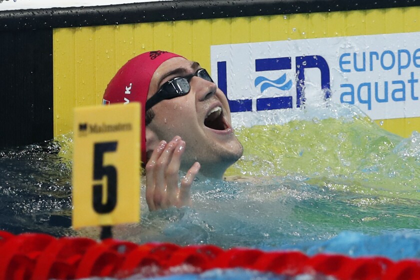 Russia's Kliment Kolesnikov reacts after setting a world record as he wins the men's 50 meter backstroke final at the European Aquatics Championships in Duna Arena in Budapest, Hungary, Tuesday, May 18, 2021. (AP Photo/Petr David Josek)