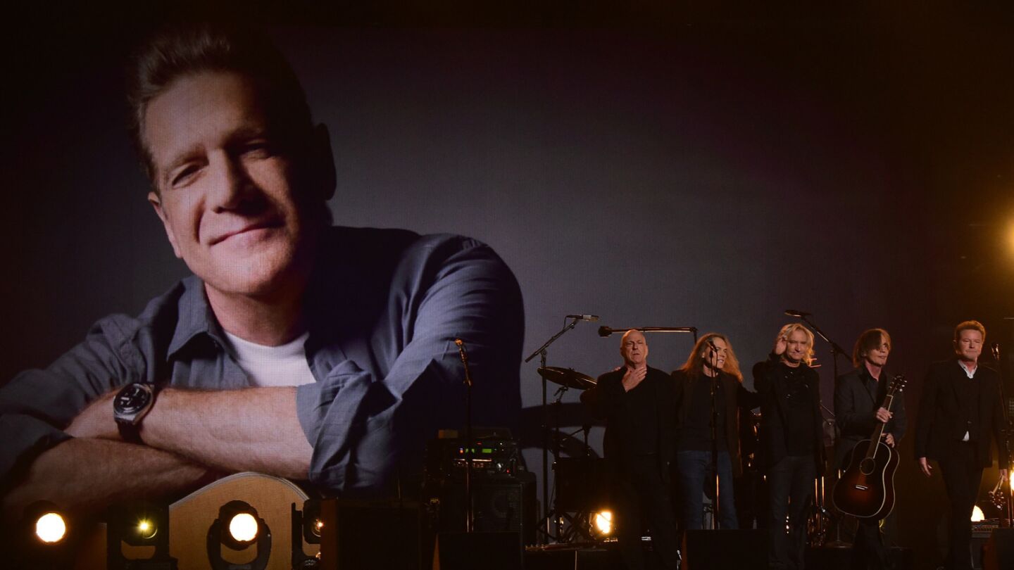 The Eagles perform onstage in a tribute to the late Glenn Frey.