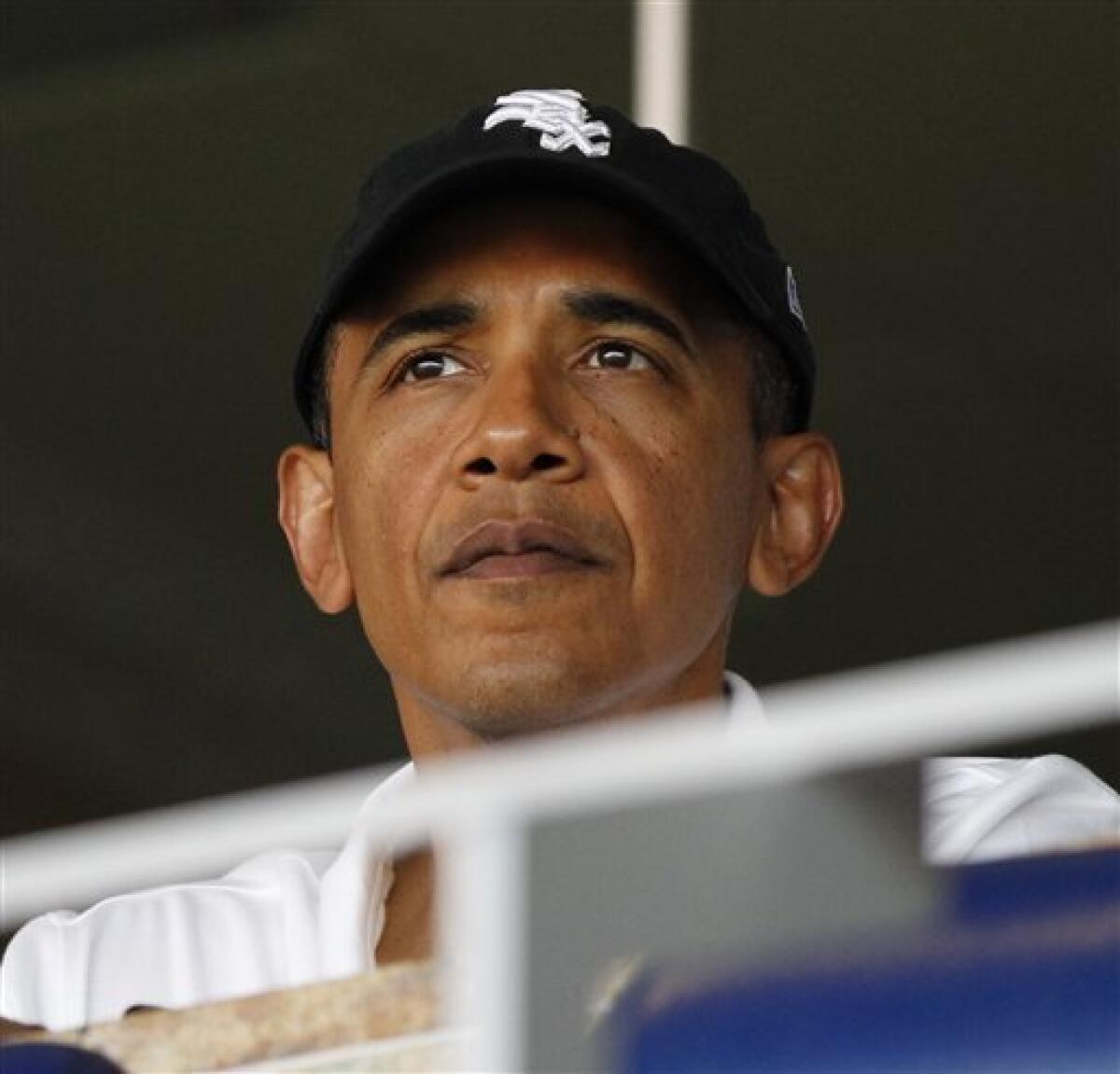 President Barack Obama attends an interleague baseball game between the Chicago White Sox and the Washington Nationals, Friday, June 18, 2010 in Washington.(AP Photo/Pablo Martinez Monsivais)