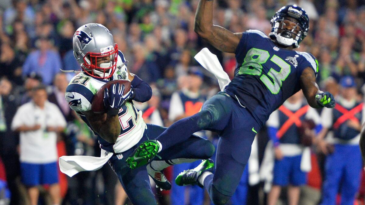 Patriots cornerback Malcolm Butler intercepts a pass intended for Seattle Seahawks receiver Ricardo Lockette during the final seconds of the Patriots' 28-24 victory in Super Bowl XLIX.