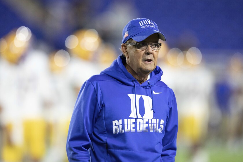 Duke coach David Cutcliffe walks on the field.