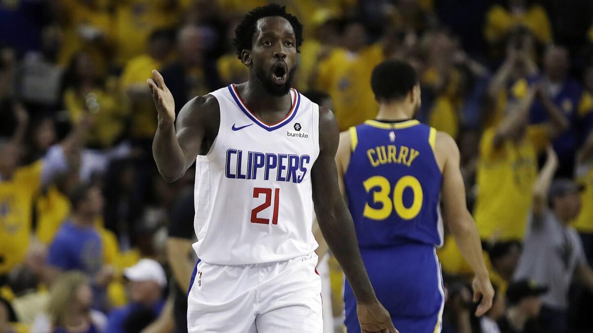 Clippers' Patrick Beverley (21) reacts to a call by referees during the second half in Game 5 of a first-round NBA playoff series against the Golden State Warriors on Wednesday in Oakland.