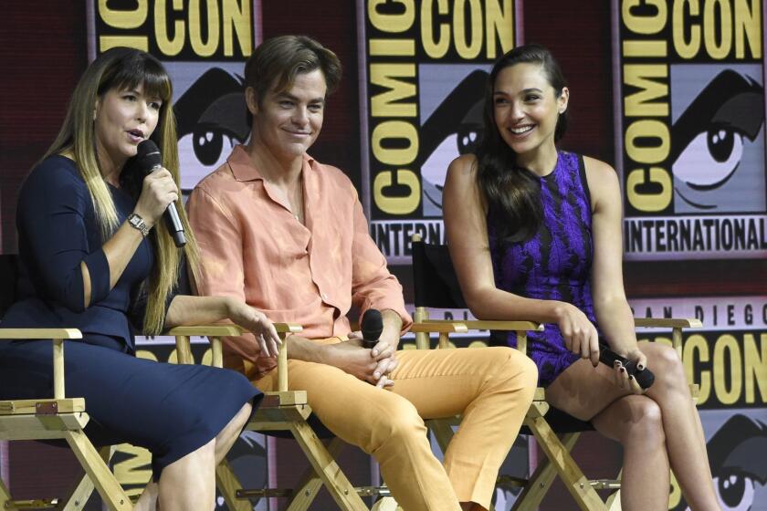 Patty Jenkins, from left, Chris Pine and Gal Gadot speak at the Warner Bros. Theatrical panel for "Wonder Woman 1984" on day three of Comic-Con International on Saturday, July 21, 2018, in San Diego. (Photo by Chris Pizzello/Invision/AP)