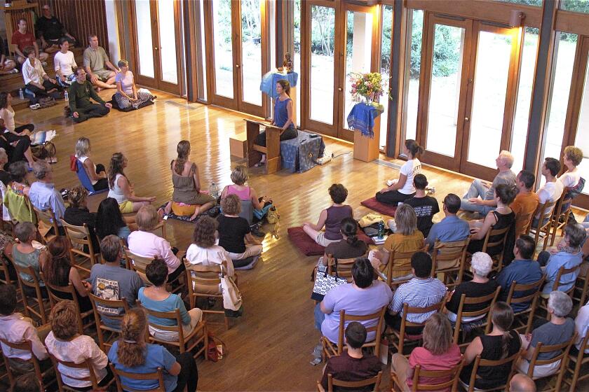 This photo shows Tara Brach leading a meditation class at the River Road Unitarian Universalist Church in Bethesda, Maryland on March 23, 2012. Research shows a daily meditation practice can reduce anxiety, improve overall health and increase social connections, among other benefits. (Jonathan Foust/River Road Unitarian Universalist Church via AP)