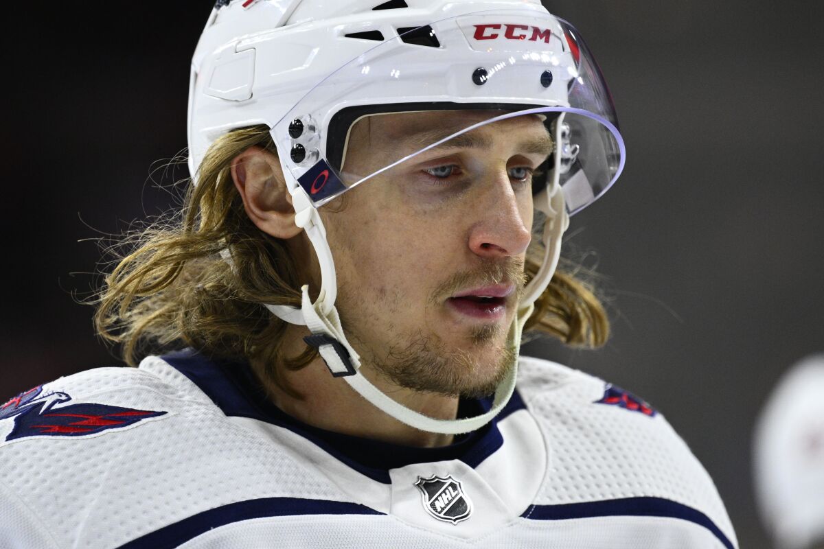 FILE - Washington Capitals' Carl Hagelin is shown during an NHL hockey game against the Philadelphia Flyers, Thursday, Feb. 17, 2022, in Philadelphia. Hagelin is expected to miss an extended period of time because of an eye injury. Hagelin was struck with an errant stick during practice Tuesday, March 1, 2022. It was not immediately clear which eye or if Hagelin required surgery.(AP Photo/Derik Hamilton)