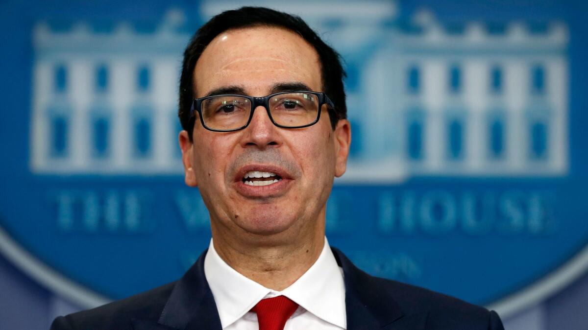 Treasury Secretary Steven Mnuchin speaks during a news briefing at the White House in August.