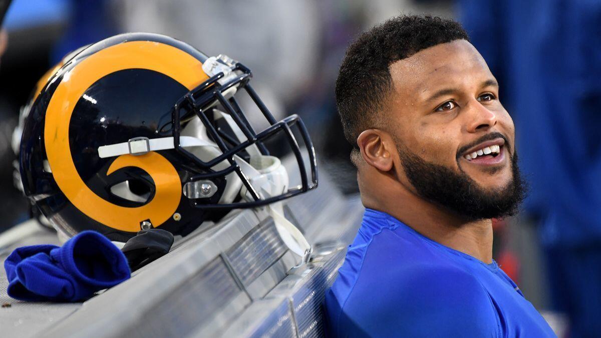 Rams defensive tackle Aaron Donald sits on the bench late in the fourth quarter during a game against the San Francisco 49ers on Dec. 30 at the Coliseum.