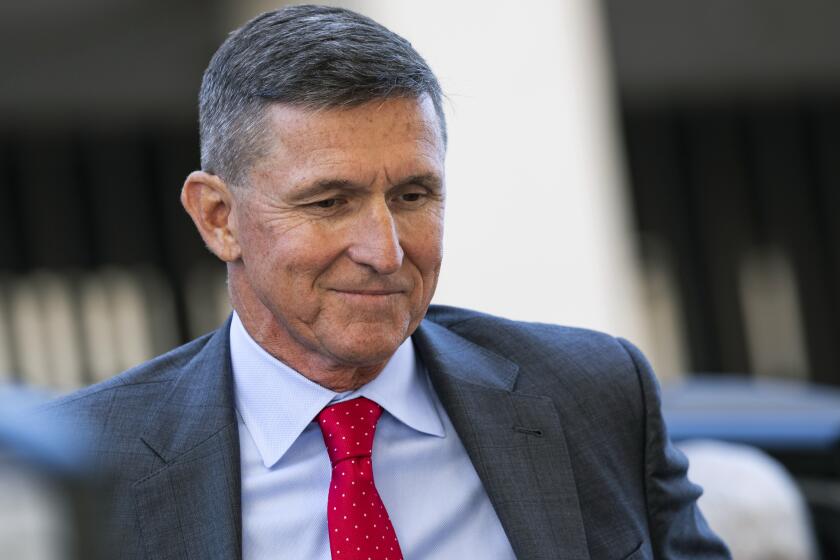 FILE -- Michael Flynn, President Donald Trump's first national security adviser, arrives at federal court in Washington for a sentencing hearing on July 10, 2018. Lawyers for Flynn asked a federal judge on Aug. 30, 2019, to delay his sentencing, saying they believed prosecutors had material that could exonerate him. The government dismissed those claims. (Samuel Corum/The New York Times)