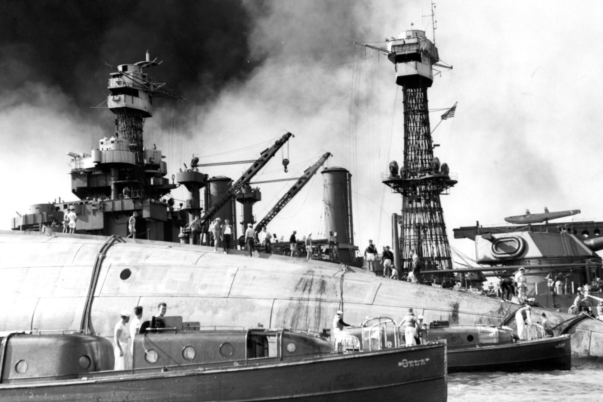 Rescuers on the capsized battleship Oklahoma at Pearl Harbor.