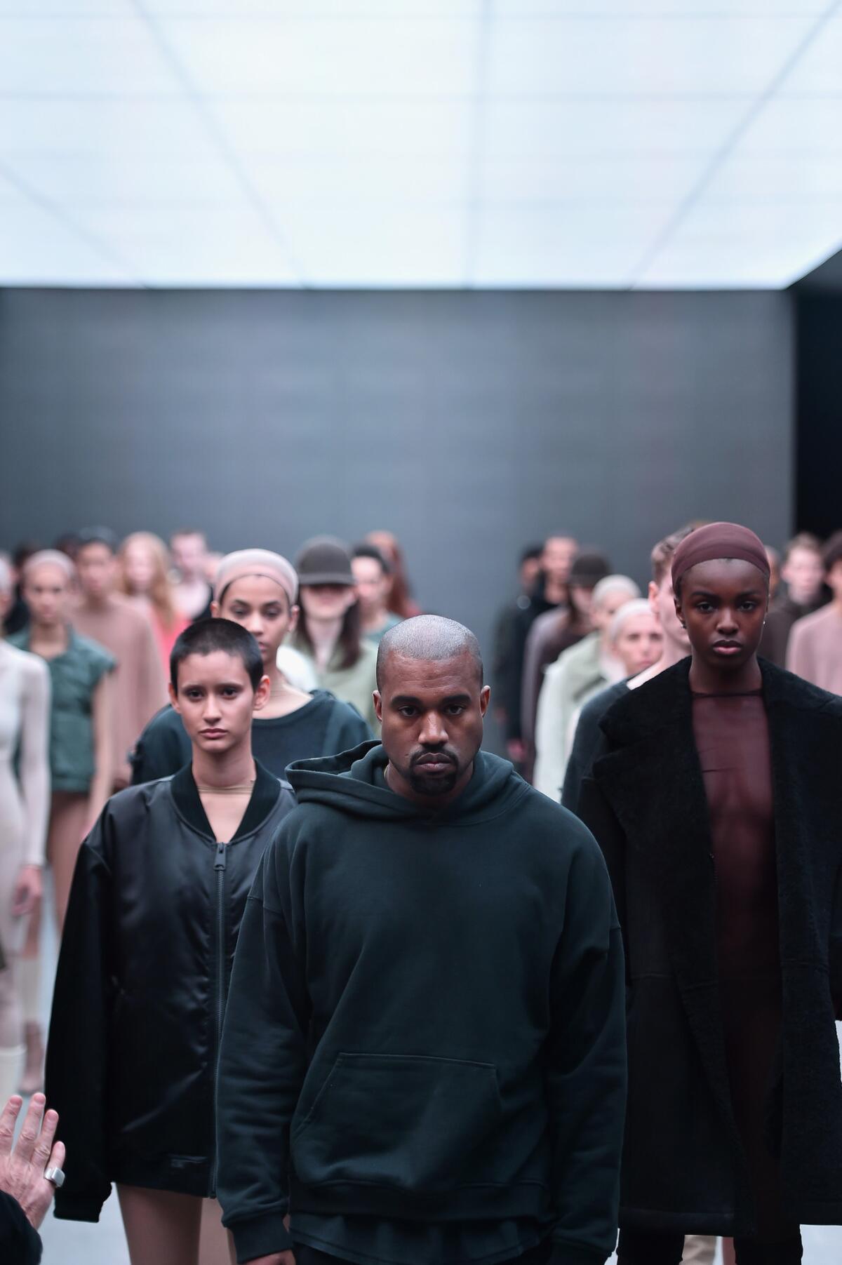 Kanye West on the runway at Skylight Clarkson Square in New York for the Adidas Originals x Kanye West Yeezy Season 1 fashion show during New York Fashion Week on Feb. 12, 2015.