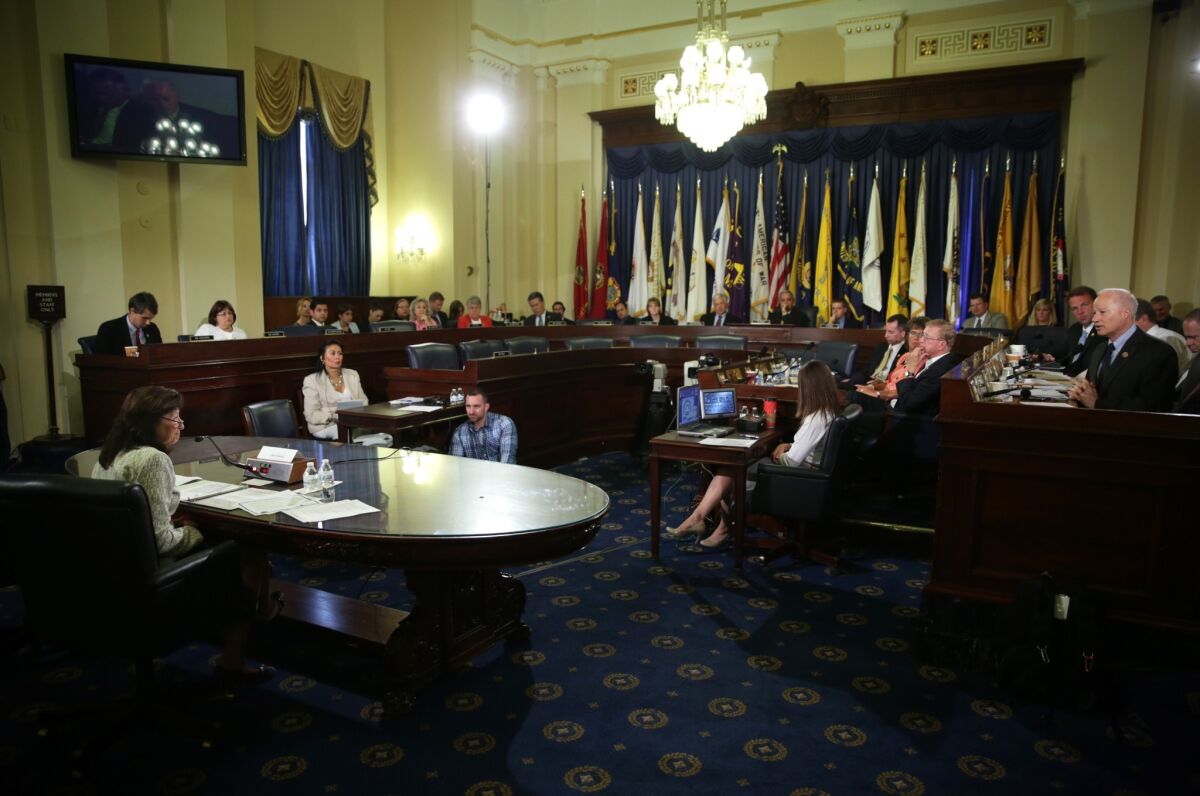 Gina Farrisee, the VA's assistant secretary for human resources and administration, testifies during a hearing on bonuses Friday before the House Veterans' Affairs Committee.